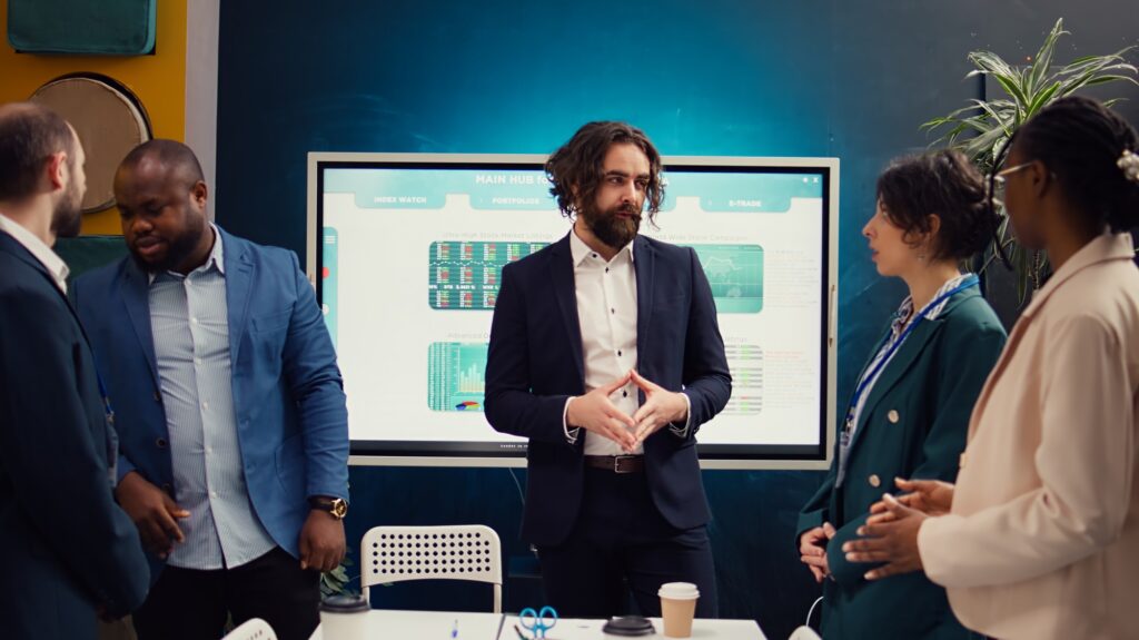 Group of enterprise colleagues meeting in a boardroom office