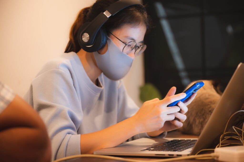 Remote work during epidemic. Woman working from home with the concept of new normal lifestyle