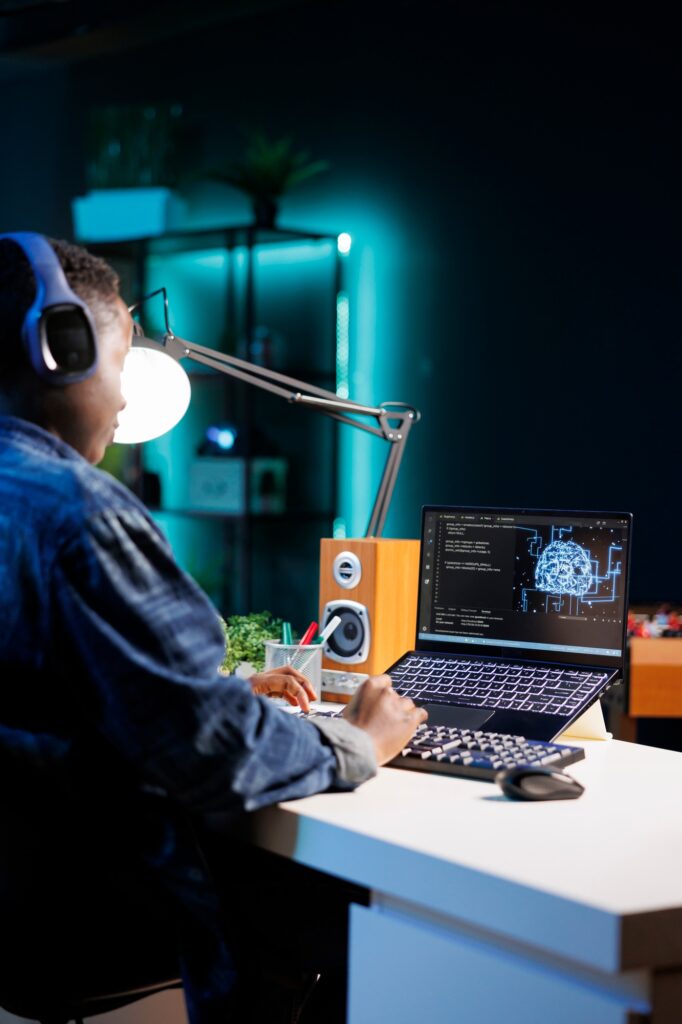 Woman managing cyber security on laptop